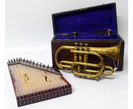 Dipano Auto harp and brass cornet by Butler, London in carrying box. Condition report: see terms and conditions.