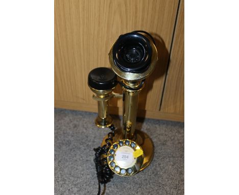 AN ASTRAL BRASS STICK TELEPHONE