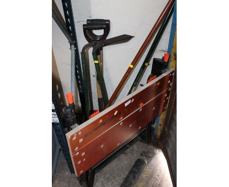 A BLACK & DECKER WORKBENCH + A SELECTION OF GARDEN TOOLS