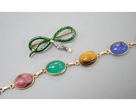 A 14k yellow metal and six stone multi gem set 'scarab' bracelet, 18.5cm, gross 15.4 grams and a yellow metal, diamond, drop 