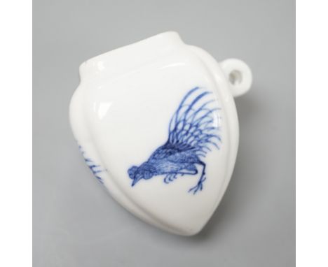 A Chinese blue and white bird feeder, Kangxi mark,6cms high.