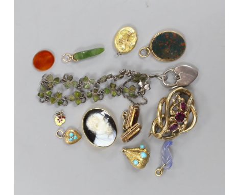 A small group of Victorian and later jewellery including a 1920's silver 'shamrock' bracelet, garnet  set scroll brooch, bloo