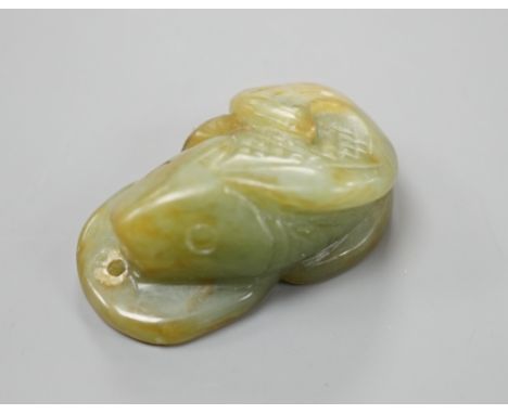 A Chinese jade fish and cash pendant, 3.4cm