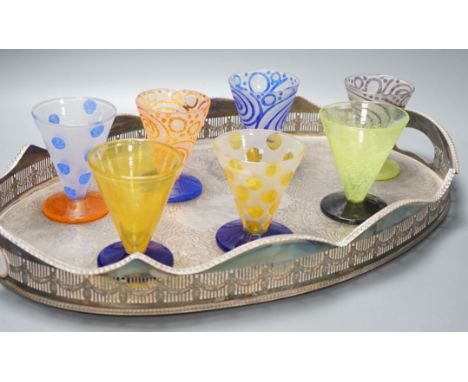 A plated tea tray, 7 art glass glasses and a Markus Karl Losse ‘World Wheels’ tie
