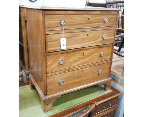A George III mahogany hinged top commode with dummy drawer front and brass handles, width 66cm, depth 42cm, height 74cm