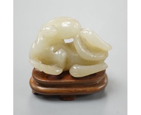 A 19th century Chinese jade recumbent cat,5cms wide.