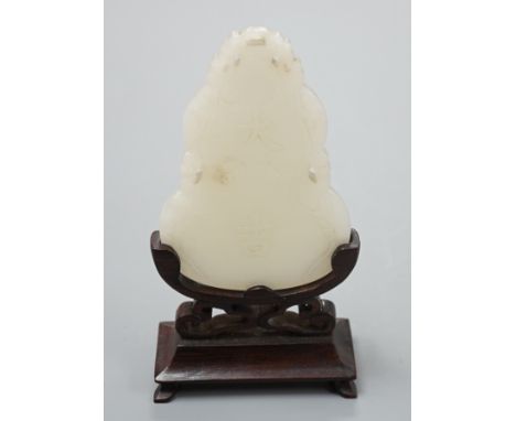 A Chinese inscribed white jade gourd shaped plaque on stand, with calligraphy,12cms high.