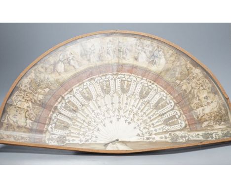 A cased 19th century French lithograph paper leaf and bone stick fan, 56 cms wide.