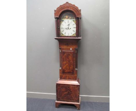 A Victorian mahogany longcase clock, painted arched dial with seconds dial and date aperture, lacking weights and pendulum 21