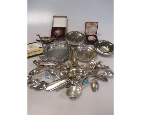 A collection of silver flatware, 4 silver dishes, two silver medals and a Norwegian silver and enamel salt and spoon in the s