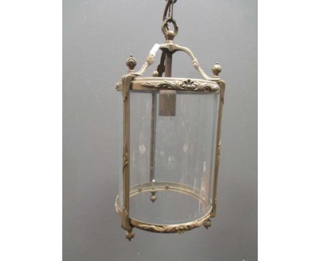A brass cylindrical hall lantern