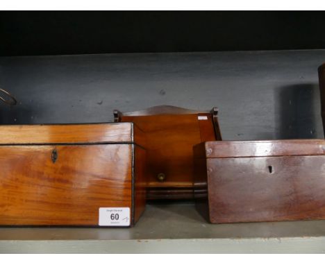 A mixed lot comprising a Victorian mahogany wedge shaped desk top stationery cabinet, a further mahogany tea caddy and one ot