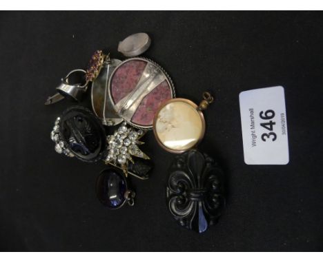 A selection of gem-set jewelleryTo include jet brooches, an agate brooch, an amethyst pendant and paste brooches. 