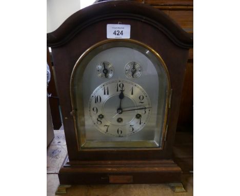 A 20th Century bracket clock, silvered dial with Arabic numerals and subsidiary strike silent dial and fast/slow dial, set in