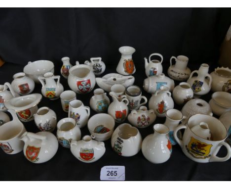 A collection of W H Goss and other miniature crested china items, in a wide and varied selection of designs 