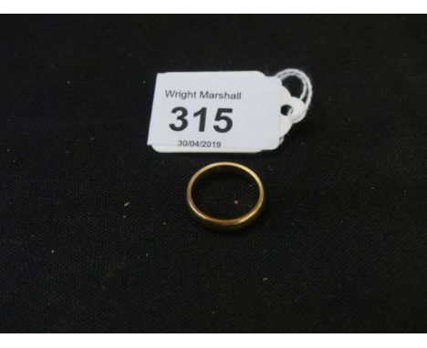 An 18ct gold band ringHallmarks for Birmingham, 1998, ring size I, weight approx. 4g. 