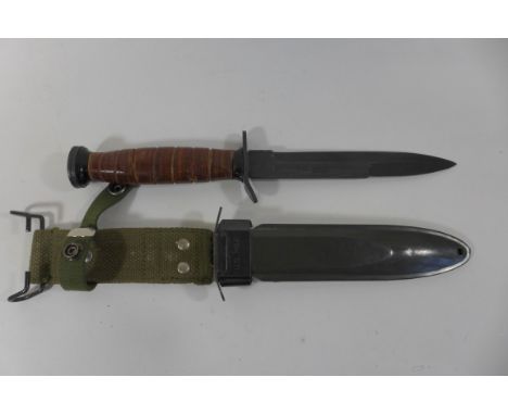 A United States of America MA1I knife, 16.5cm straight blade, with wooden grip, complete with painted metal scabbard 