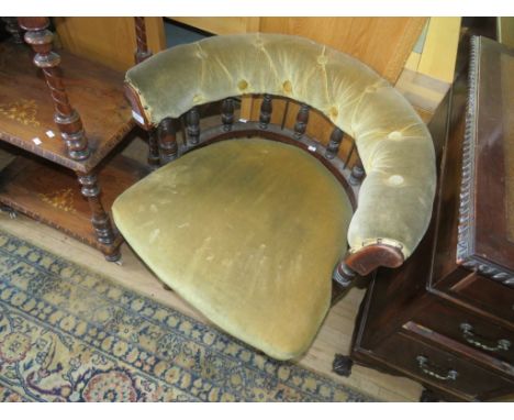 A late 19th Century velour upholstered revolving bow back desk chair 