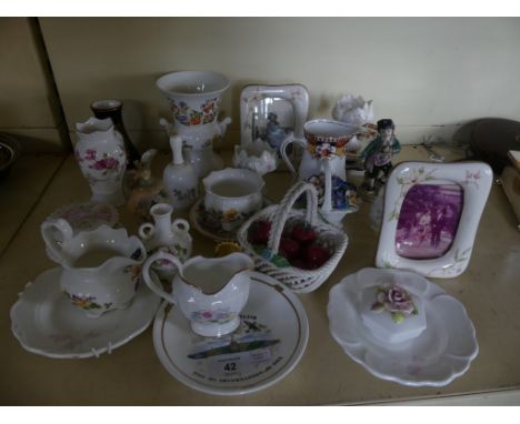 A collection of various assorted mixed ceramics to include Aynsley Cottage Garden, various model baskets decorated with fruit