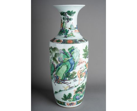 Large antique Chinese Famille Vert porcelain vase finely decorated with figures on horses and camels hunting in a mountainous