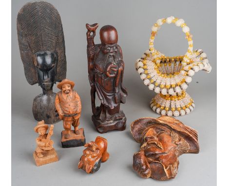 Assorted carved African Tribal tourist wares mainly masks and figures together with Continental painted carved figures, bottl