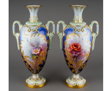 A pair of early 20th Century Royal Worcester vases, shape no: 2256, with flared octagonal necks, the white ground with gradua