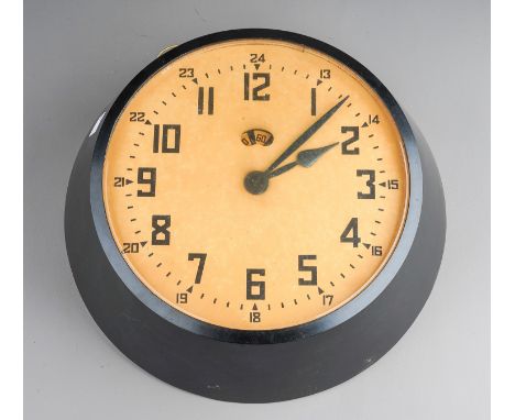 An early 20th Century English bakelite cased Garrard wall clock with hinge bracket, untested  