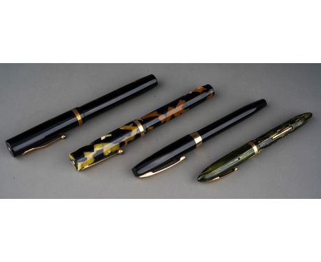 A collection of vintage Sheaffer's fountain pens to include: 1. black and gilt Lifetime fountain pen, marked on the barrel W 