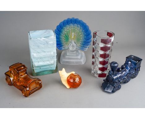 Three boxes of assorted coloured studio glass type including vases, paperweights, table ornaments, Avon moulded glass automob