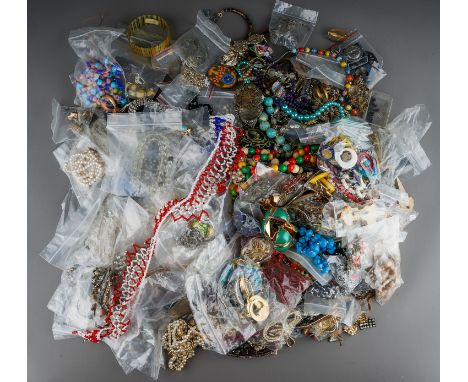 A large quantity of costume jewellery, including brooches, beads, chains, earrings, pendants, etc  