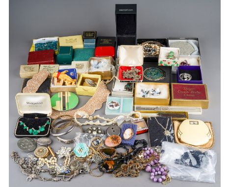 A collection of jewellery, including silver bangles, watch chain, charm bracelet, filigree necklace, locket on chain, etc; co