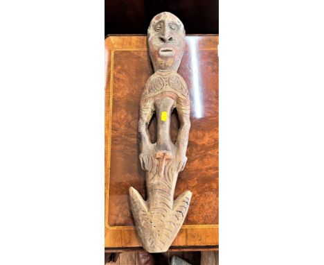 A Vintage West African Ancestor Figure. Shows signs of paint. 62cm long. 