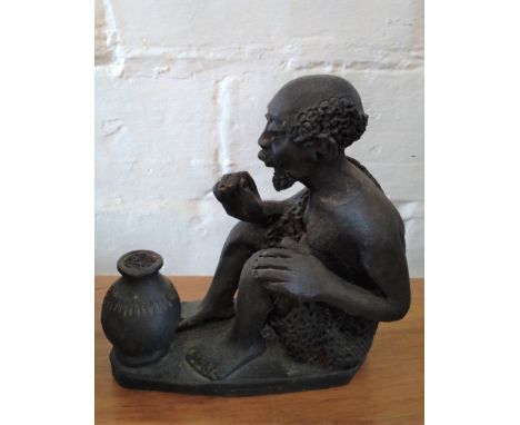 An African Vintage Terracotta Figure of Man Seated. Provenance 80 Rose Street Wokingham. 