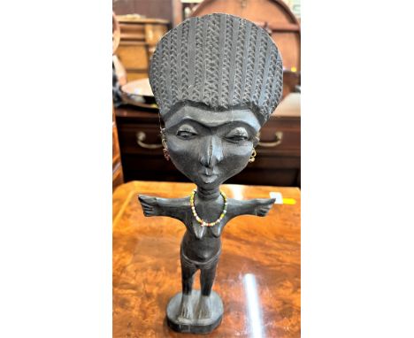 A Vintage African Fertility Figure, possibly Ashanti Ghana. In black wood. 32cm long. 