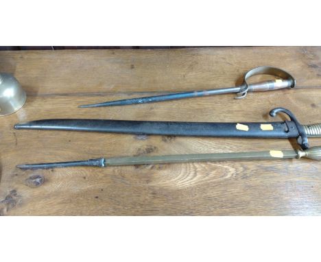 A First World War Bayonet with scabbard and two pokers. (3) 