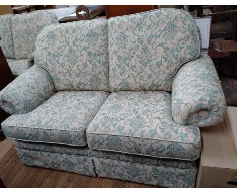 A modern 2-seater sofa by Ercol. 