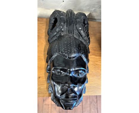 A Vintage African Handcrafted Blackwood mask. In the style of Benin, a Wall or tabletop mask. 29cm long. Provenance 80 Rose S
