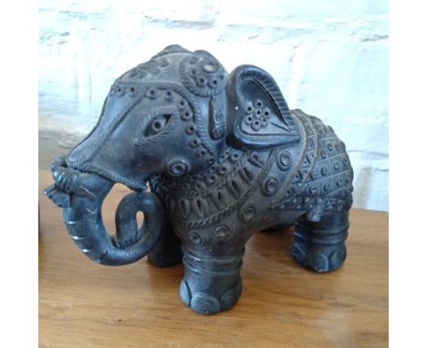 An Indian Vintage Pottery Figure of an Elephant. With rich decoration. 16cm high. 