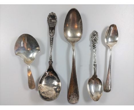 A collection of six various silver and plated spoons including caddy spoon, rifle prize spoon. 