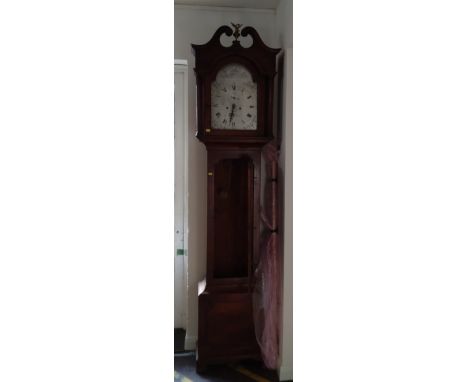 A Welsh 18th century 8-day longcase clock by Thomas Davies of Carmarthen. The silvered dial with Roman and Arabic numerals. S