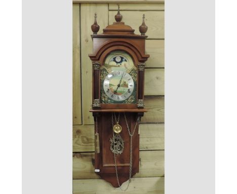 A walnut cased drop dial wall clock, with an eight day movement, 100cm tall