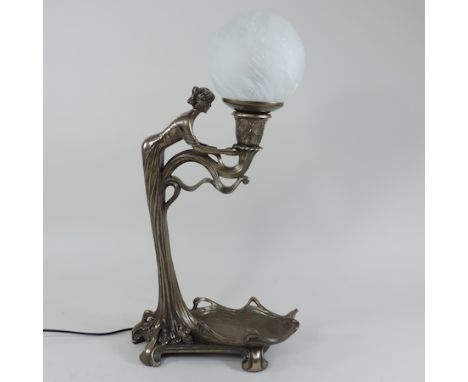 An Art Nouveau style figural lamp, with a white glass shade, 49cm tall