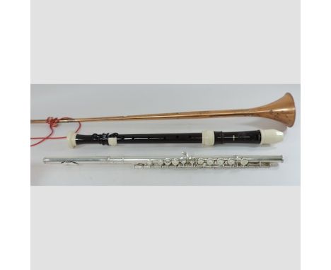 A Yamaha flute, cased, together with a copper hunting horn and a brass recorder 