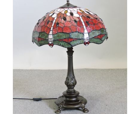 A Tiffany style table lamp, with a coloured glass shade, 72cm tall