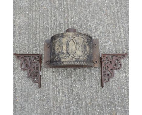 A 19th century cast iron rain hopper, together with a pair of iron brackets, a pair of fire dogs and other metalwares