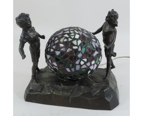 A Tiffany style table lamp, in the form of two children playing, 20cm tall