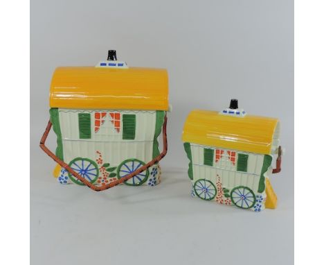 A pottery model of a gypsy caravan, together with another smaller, tallest 29cm