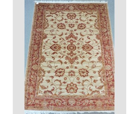 A Ziegler carpet, with all over foliate designs, on a gold ground, 280 x 200cm