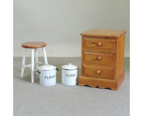 A modern pine bedside chest, together with a stool and two enamel kitchen storage jars