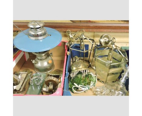 A pair of metal hanging lanterns, together with collection of light fittings and an oil lamp, 40cm tall